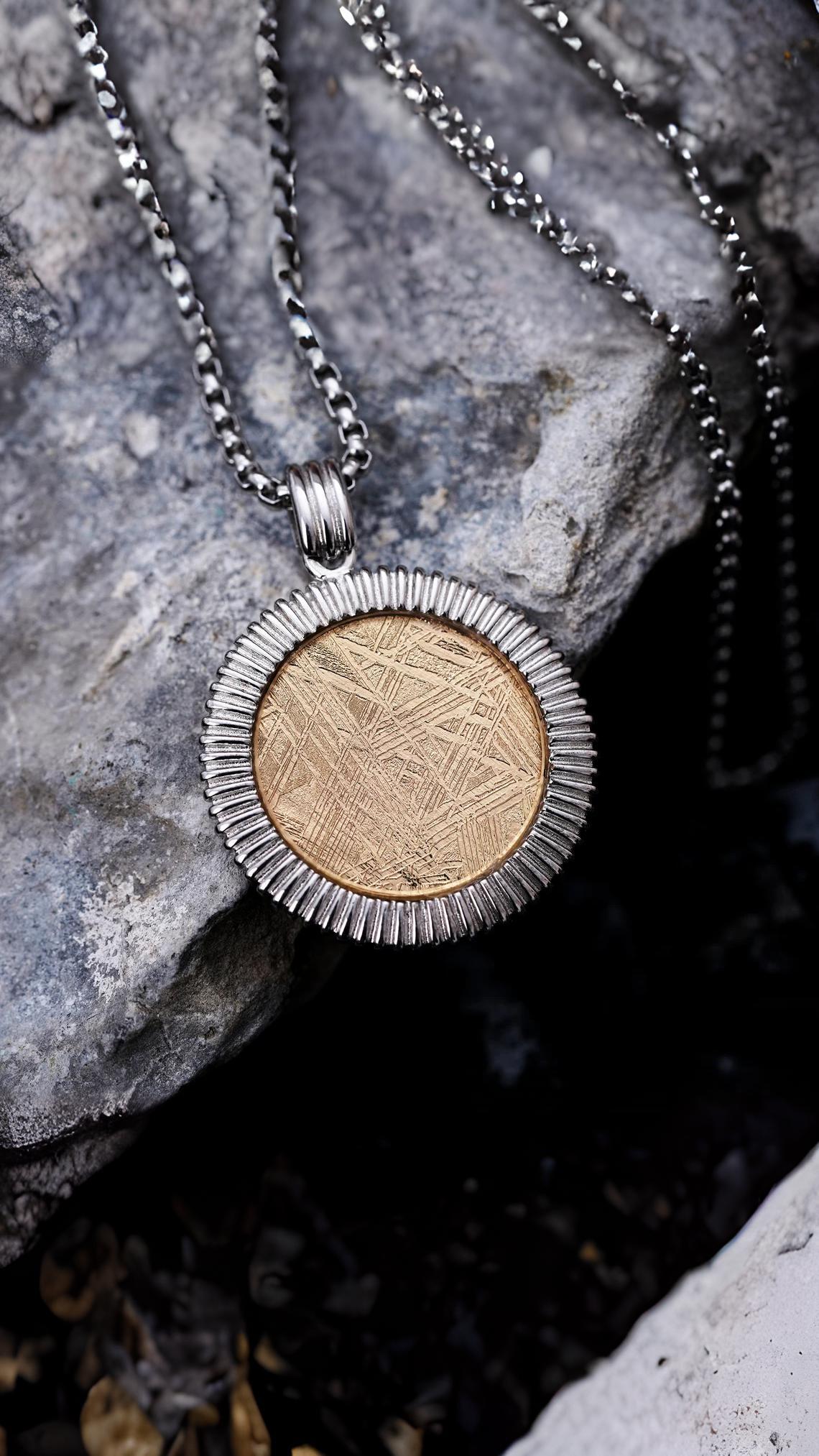 Our meteorite pendant for woman a captivating blend of elegance and cosmic charm. This unique meteorite jewelry piece adds a touch of celestial beauty, making it the perfect accessory for every woman.