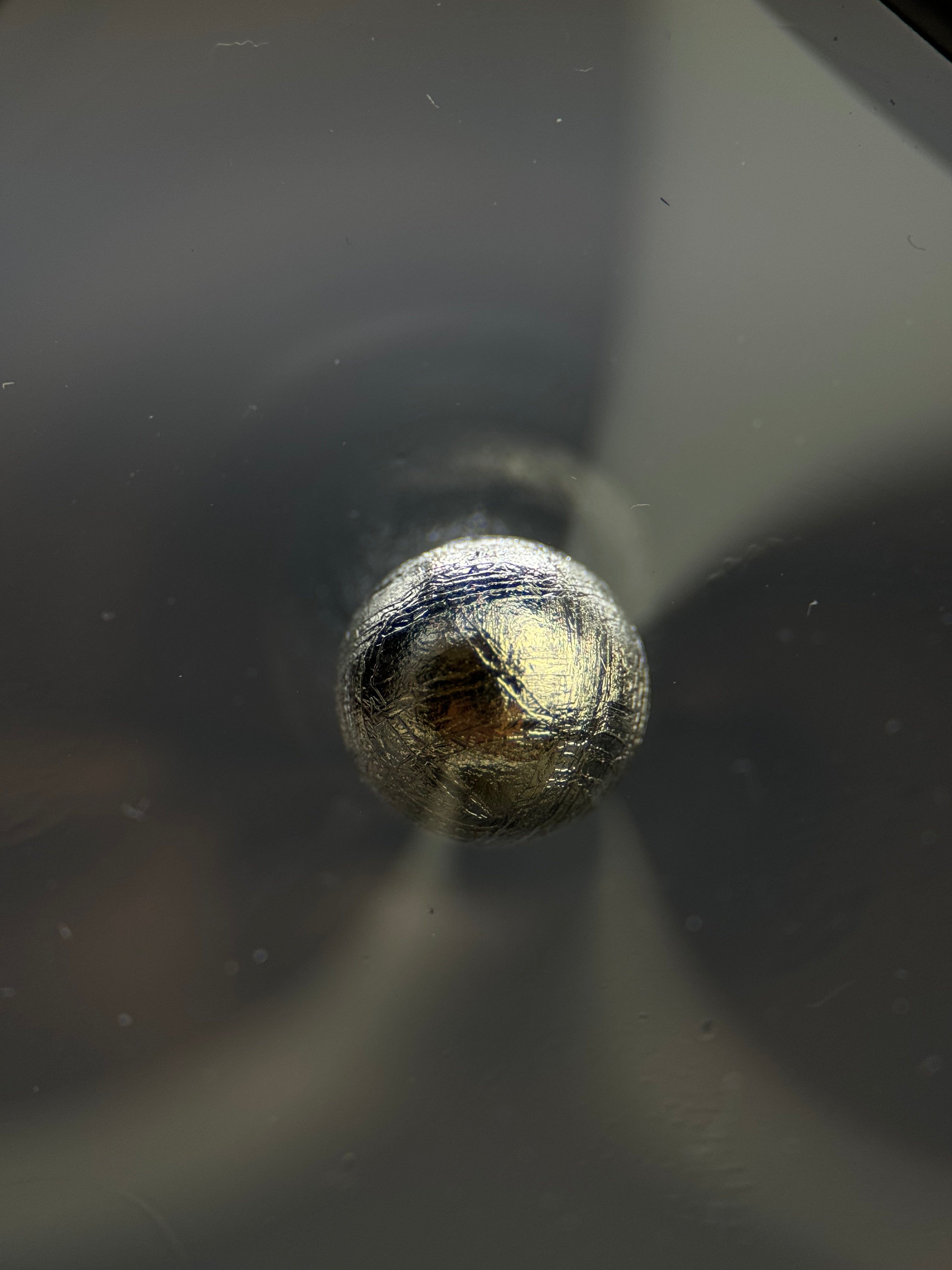 Muonionalusta meteorite, Sweden. 1cm sphere with display.