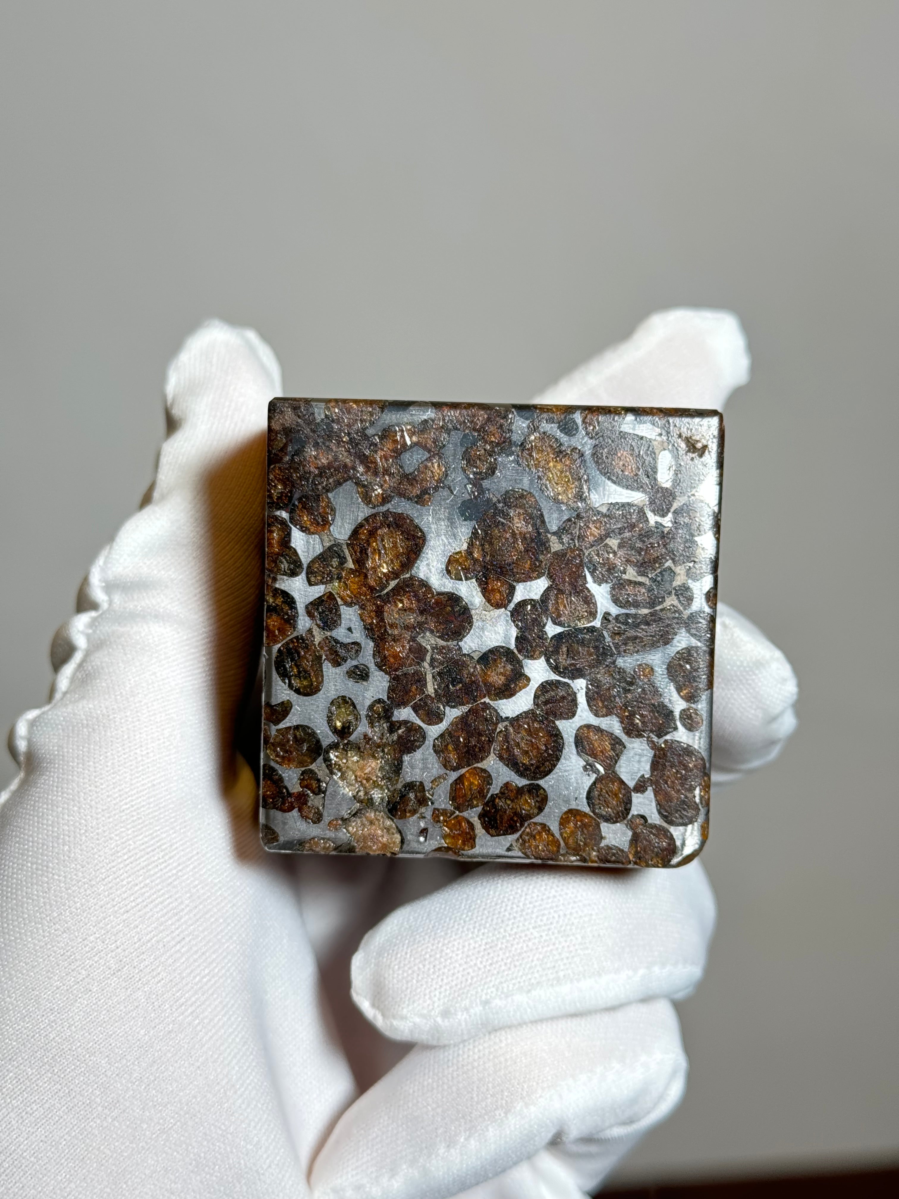 Sericho pallasite meteorite cube, Kenya. 631 grams.