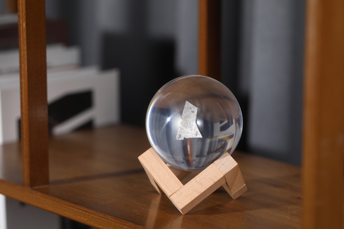 Acrylic sphere with Muonionalusta Meteorite slice
