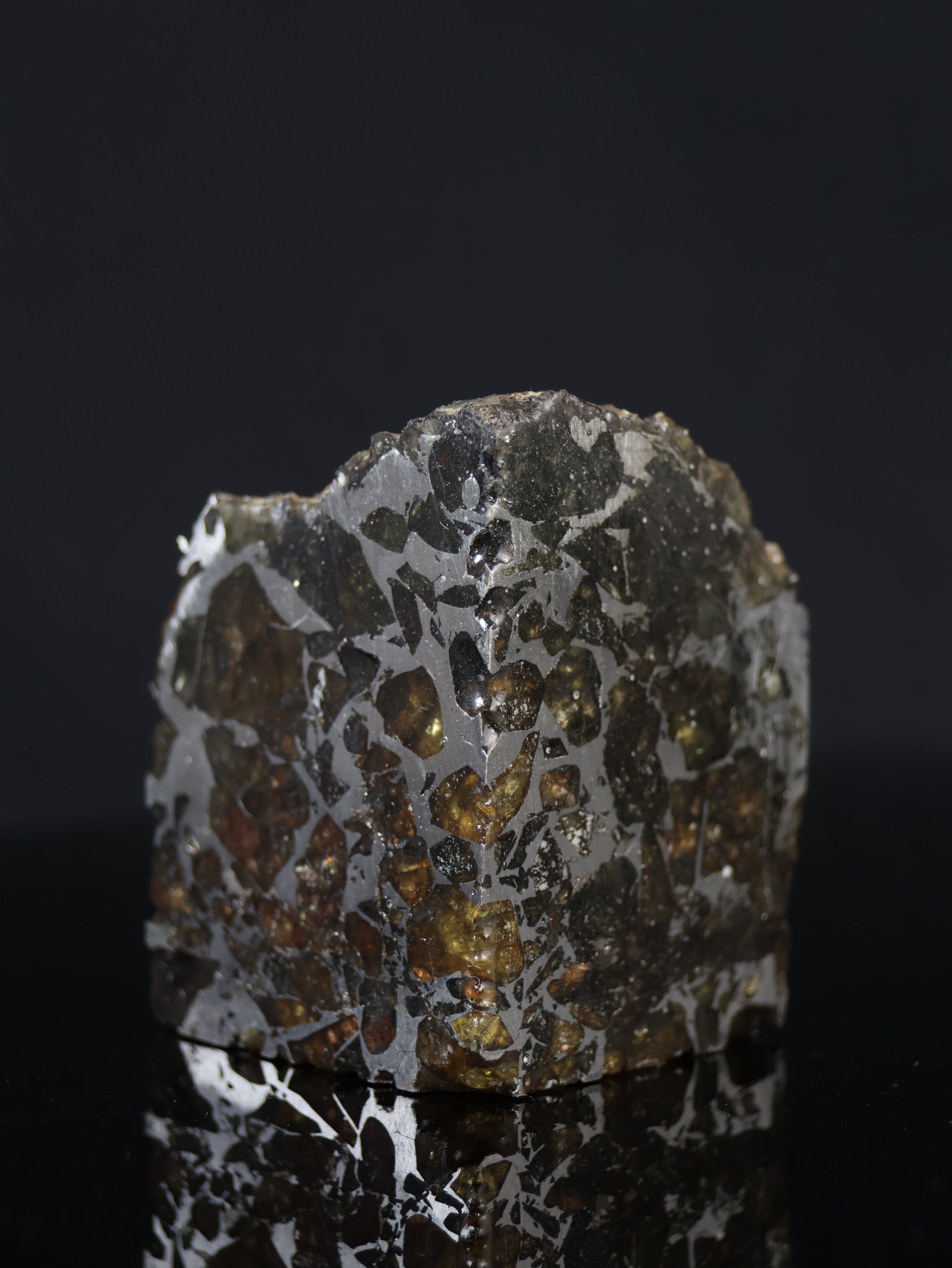 Seymchan meteorite, Russia. 95 grams end-cut.