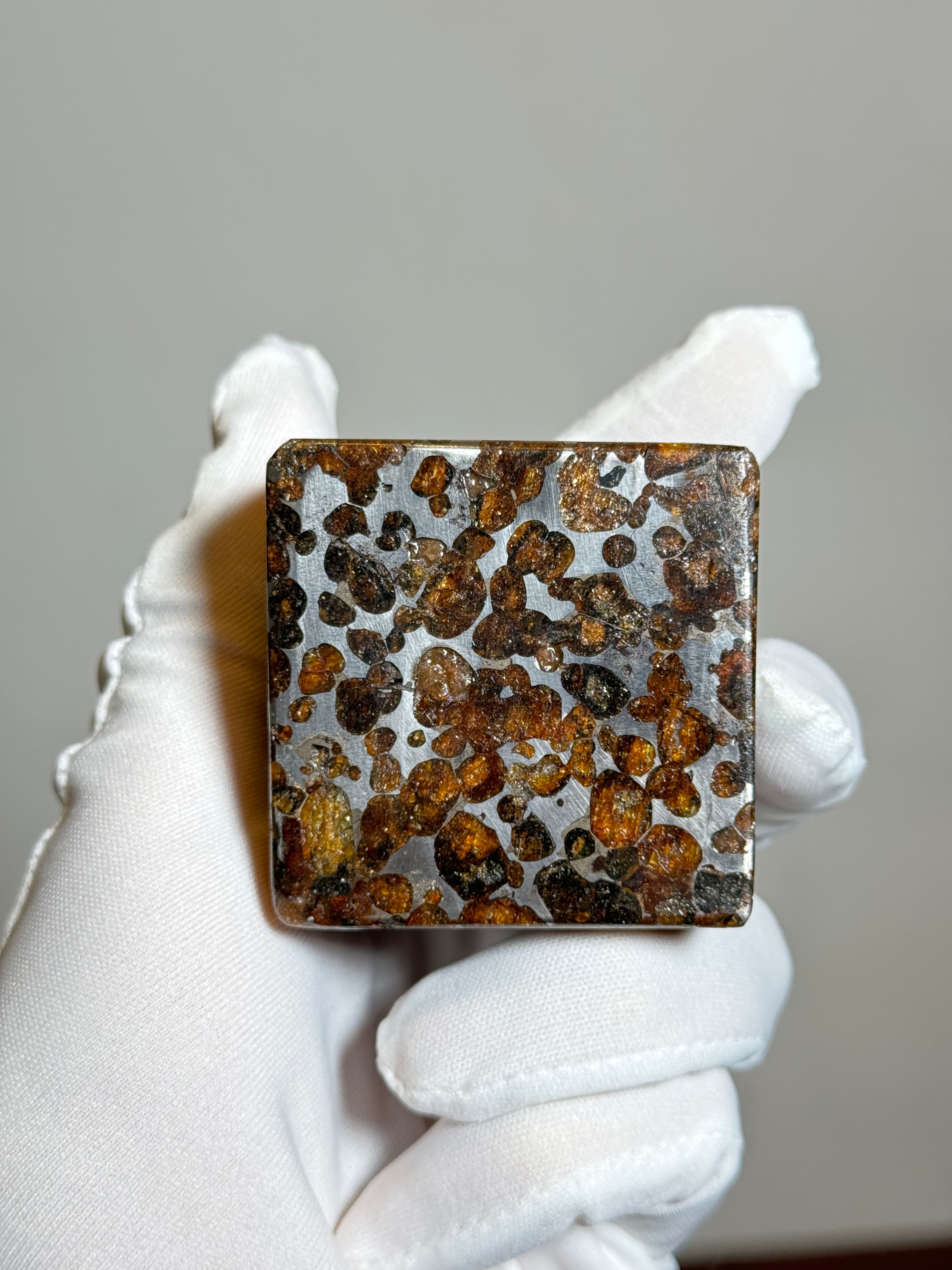 Sericho pallasite meteorite cube, Kenya. 631 grams.