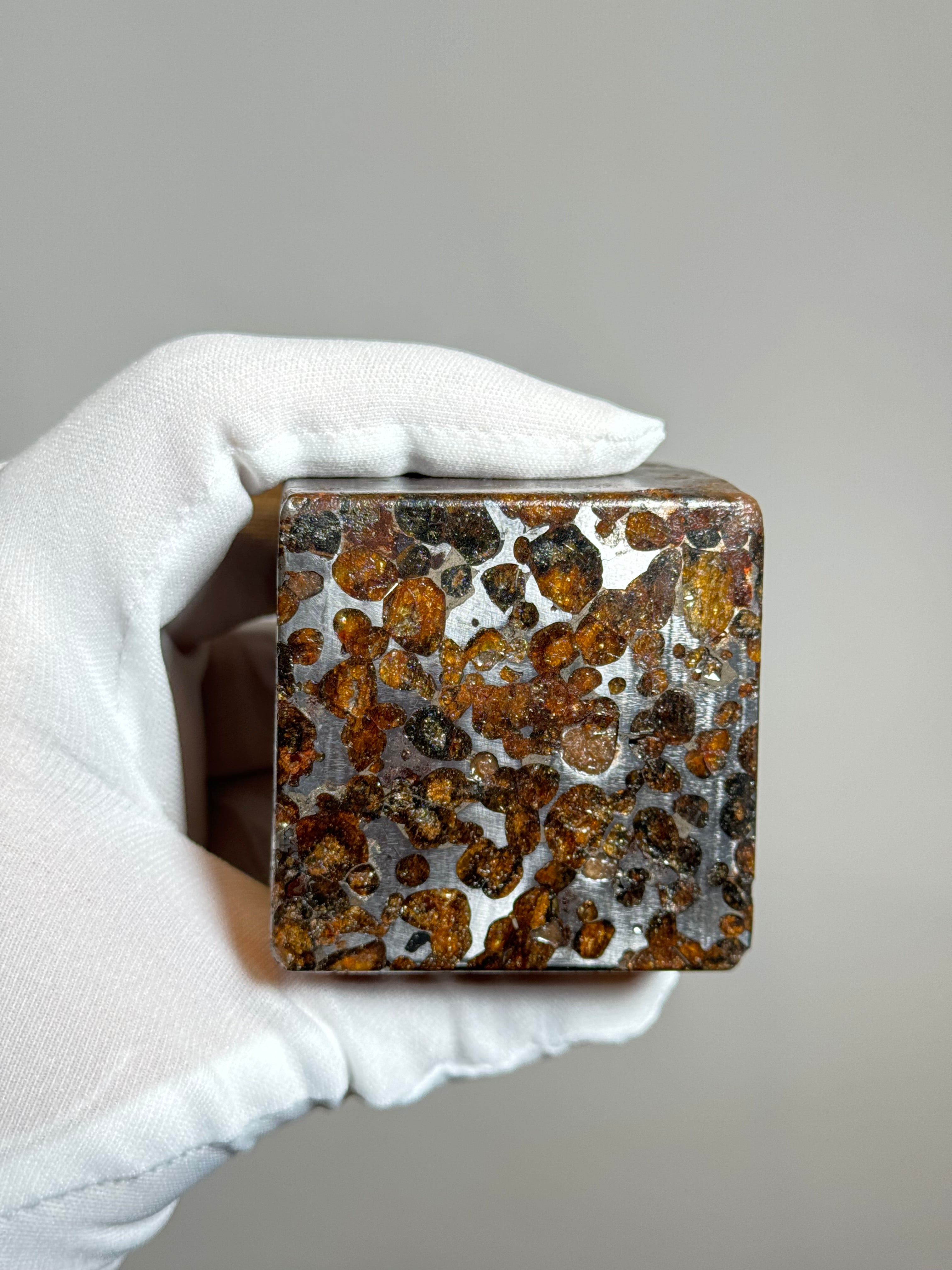 Sericho pallasite meteorite cube, Kenya. 631 grams.