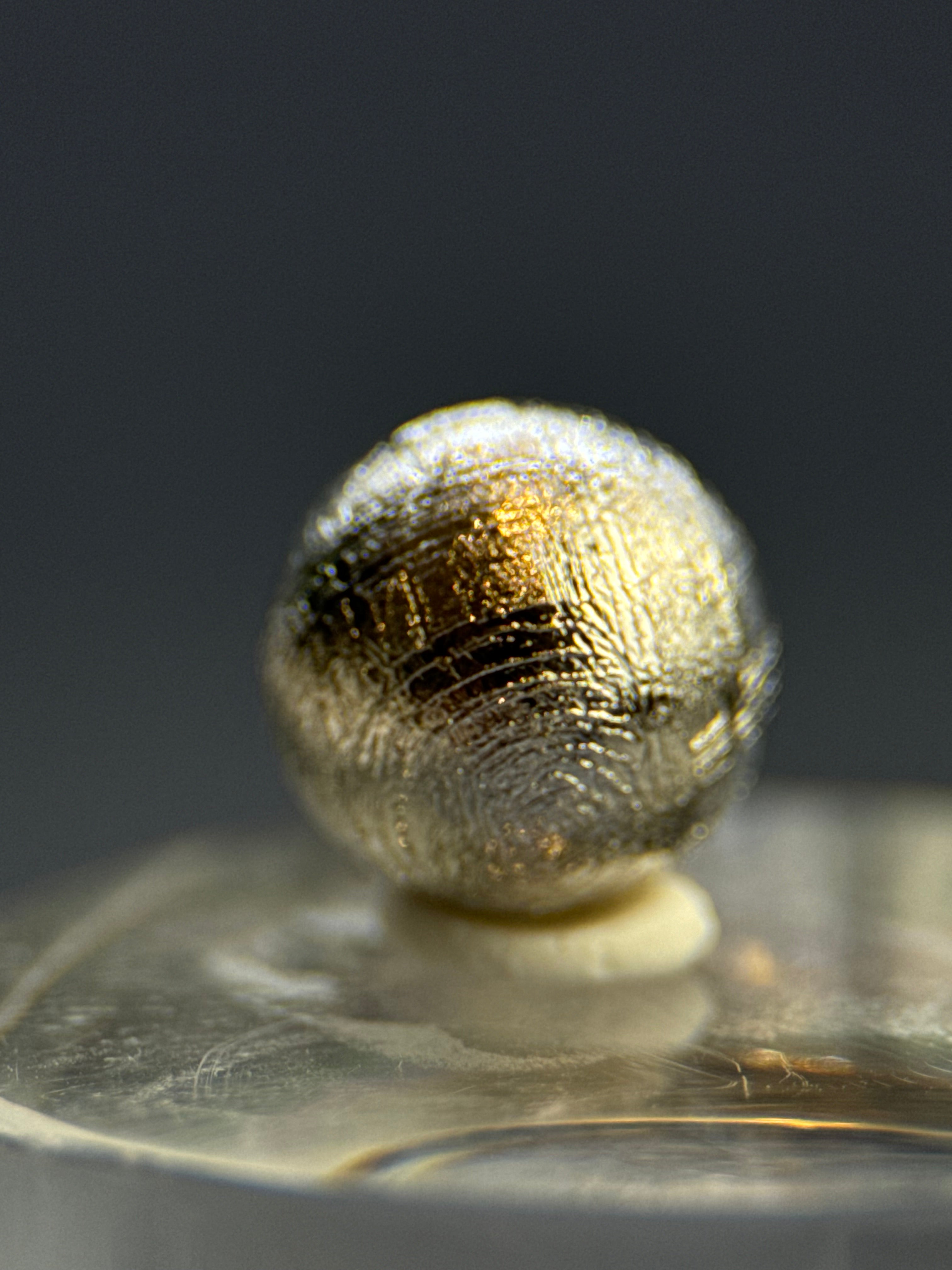 Muonionalusta meteorite, Sweden. 1cm sphere with display.