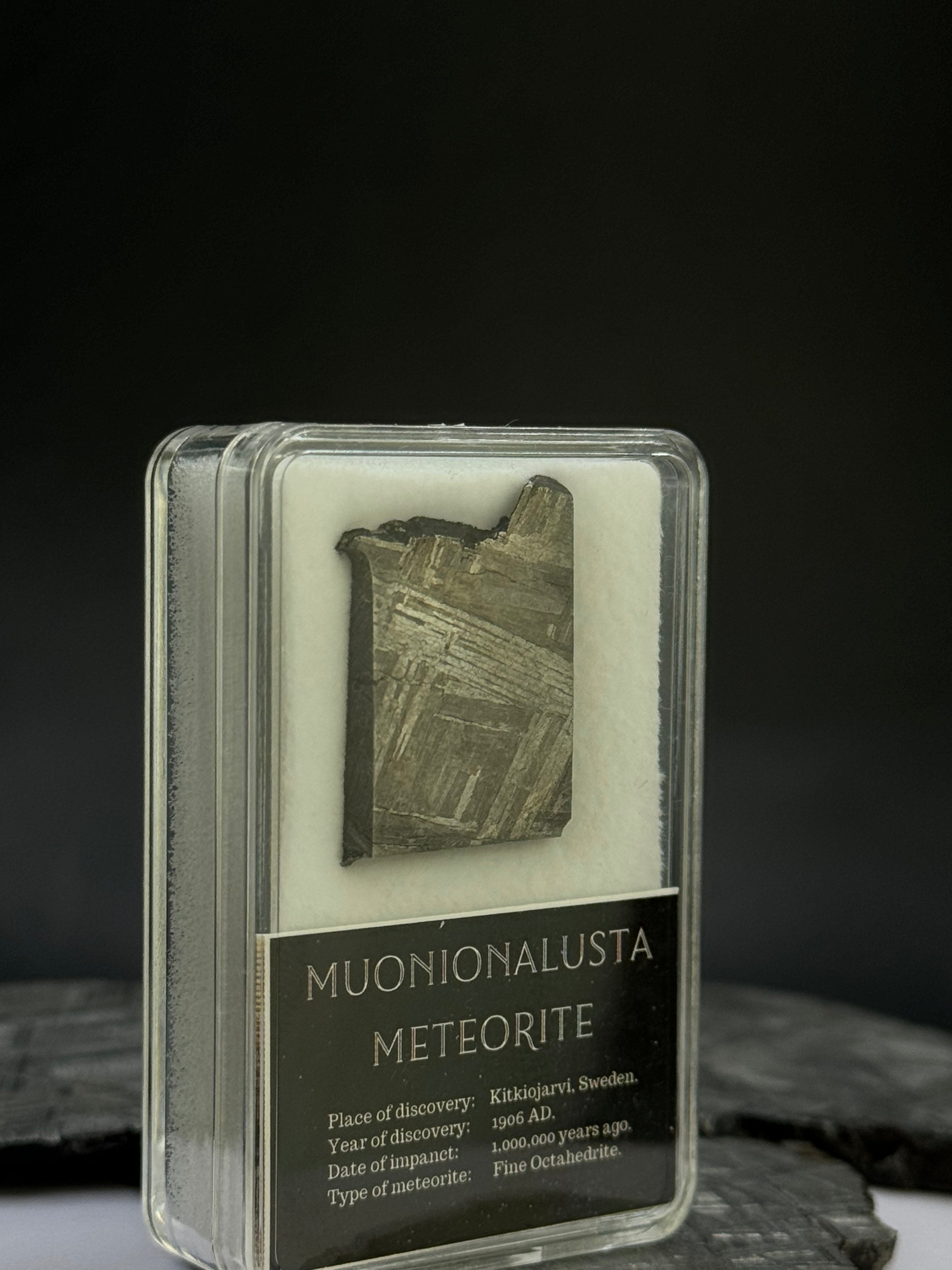 Muonionalusta meteorite in display box. 8,51 grams.