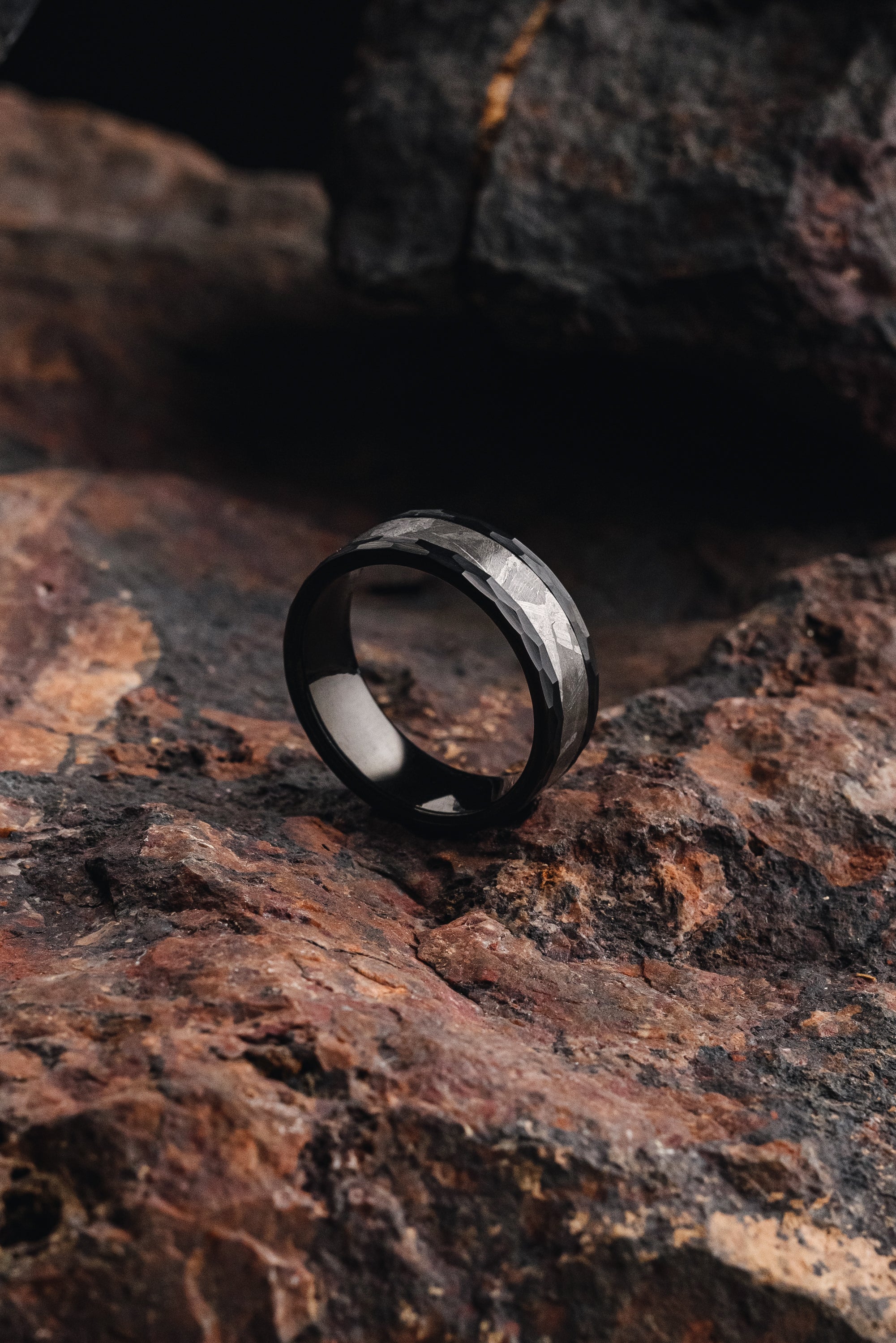 Stunning meteorite ring with black tungsten band, showcasing a genuine Muonionalusta fragment. Unique and stylish meteorite jewelry, combining cosmic beauty with contemporary design, unique meteorite ring