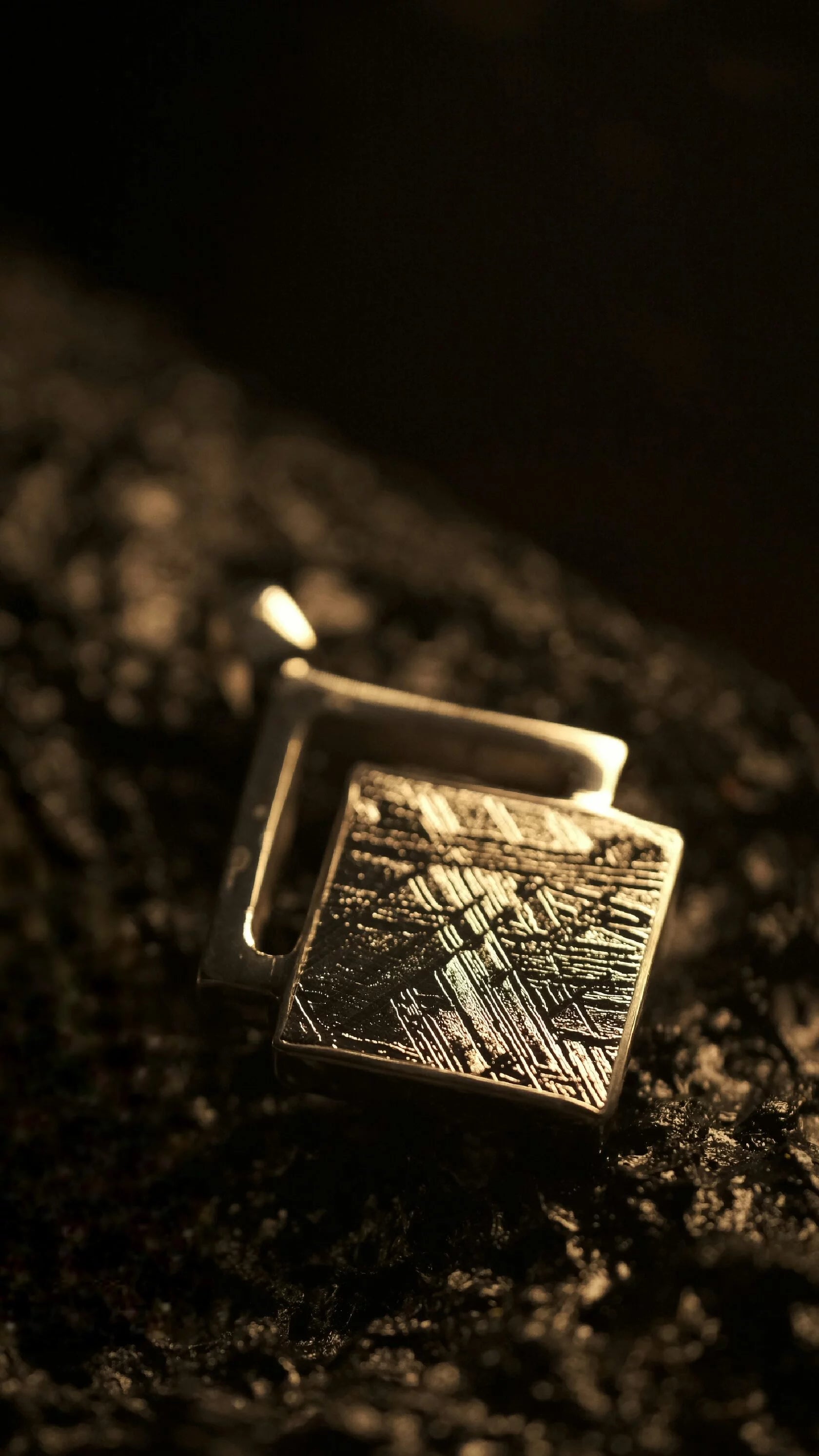 Handcrafted meteorite pendant with silver setting - authentic Muonionalusta meteorite, a celestial style with a genuine meteorite centerpiece. Explore the cosmos with this unique meteorite jewelry piece.