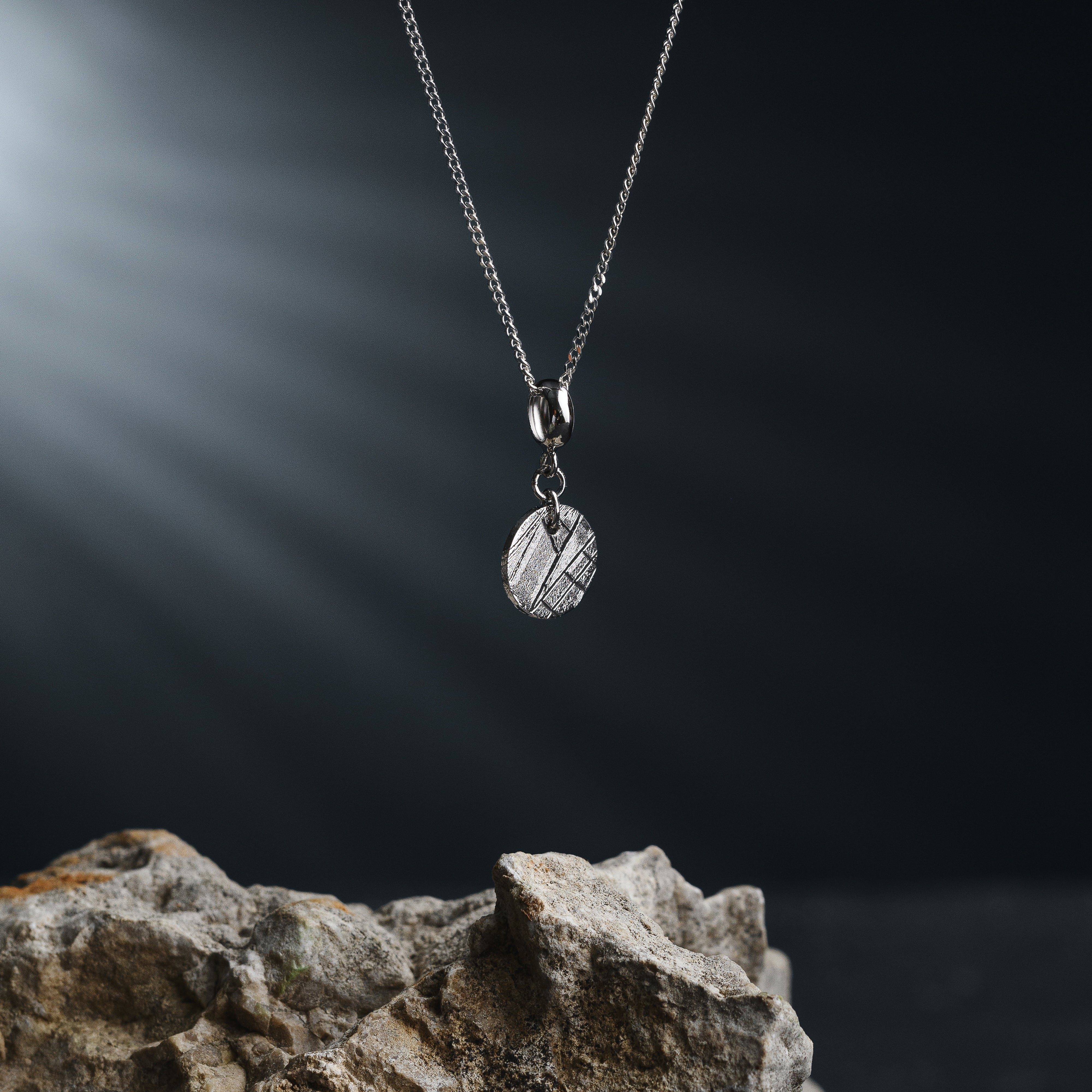 Muonionalusta meteorite disc pendant