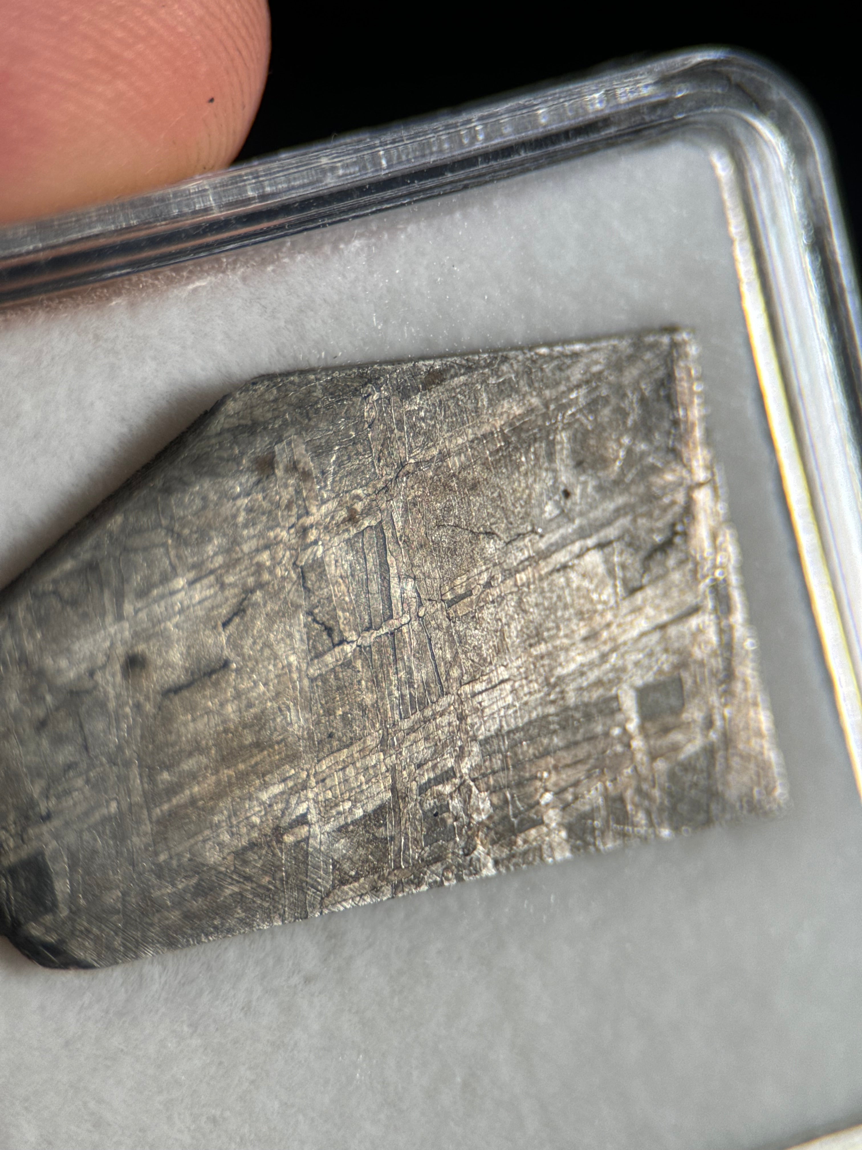 MUONIONALUSTA METEORITE IN DISPLAY BOX. 9,6 GRAMS.