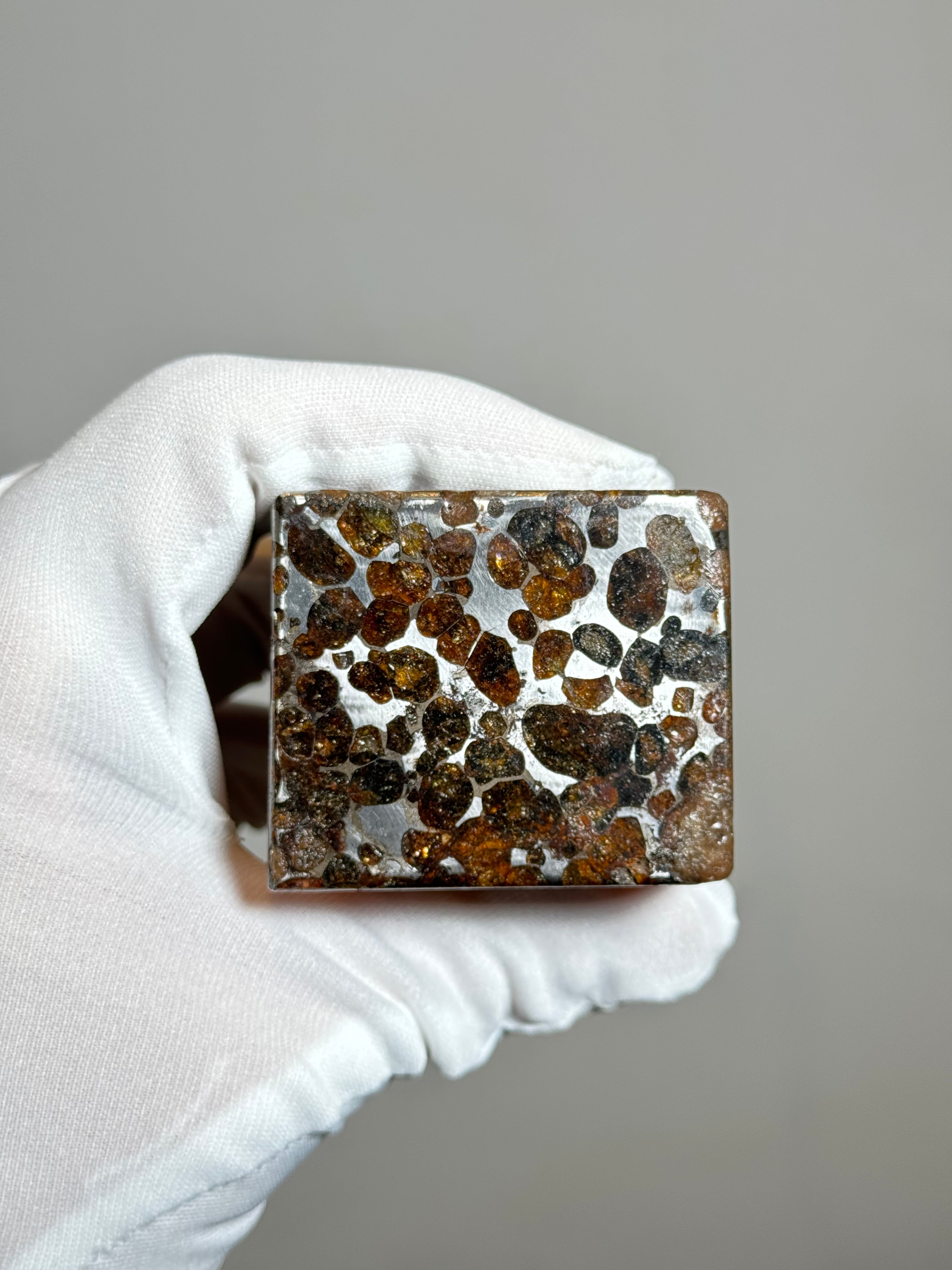 Sericho pallasite meteorite cube, Kenya. 631 grams.