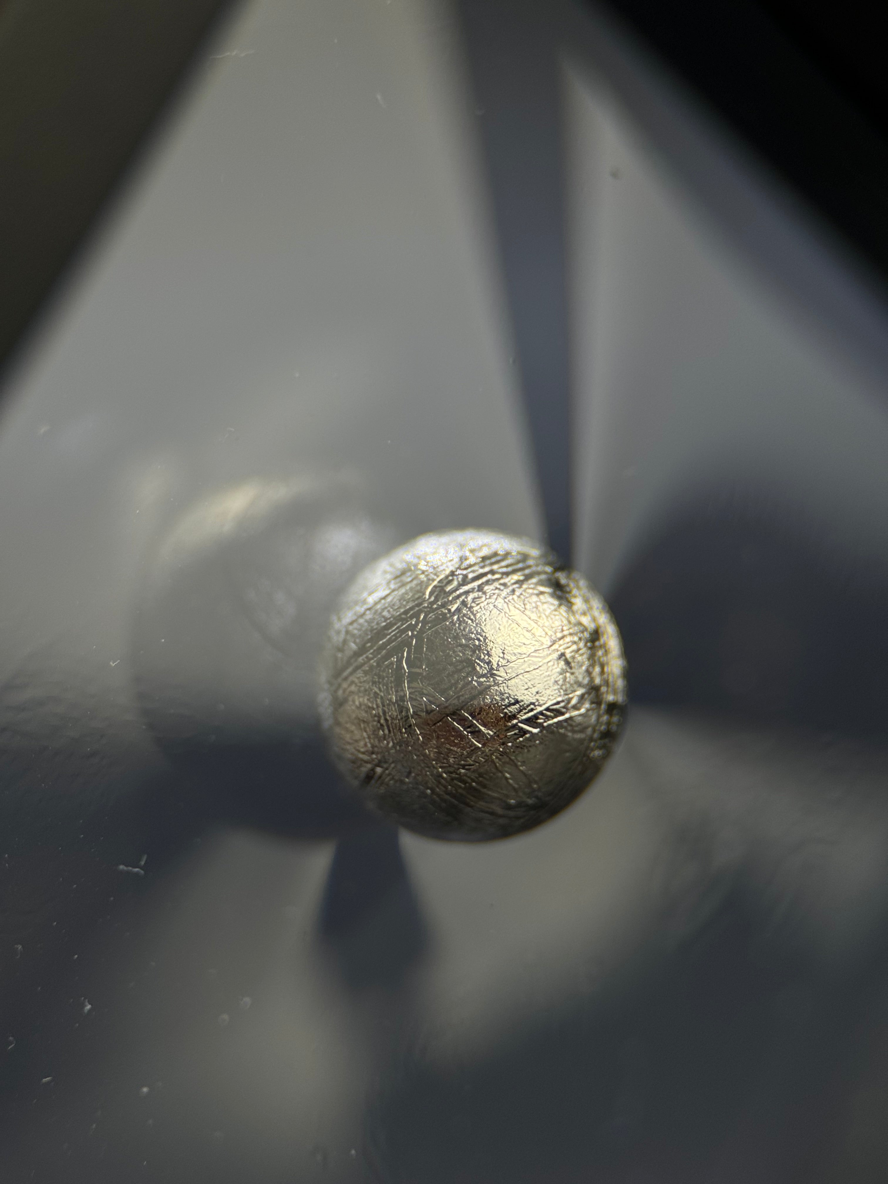 Muonionalusta meteorite, Sweden. 1cm sphere with display.