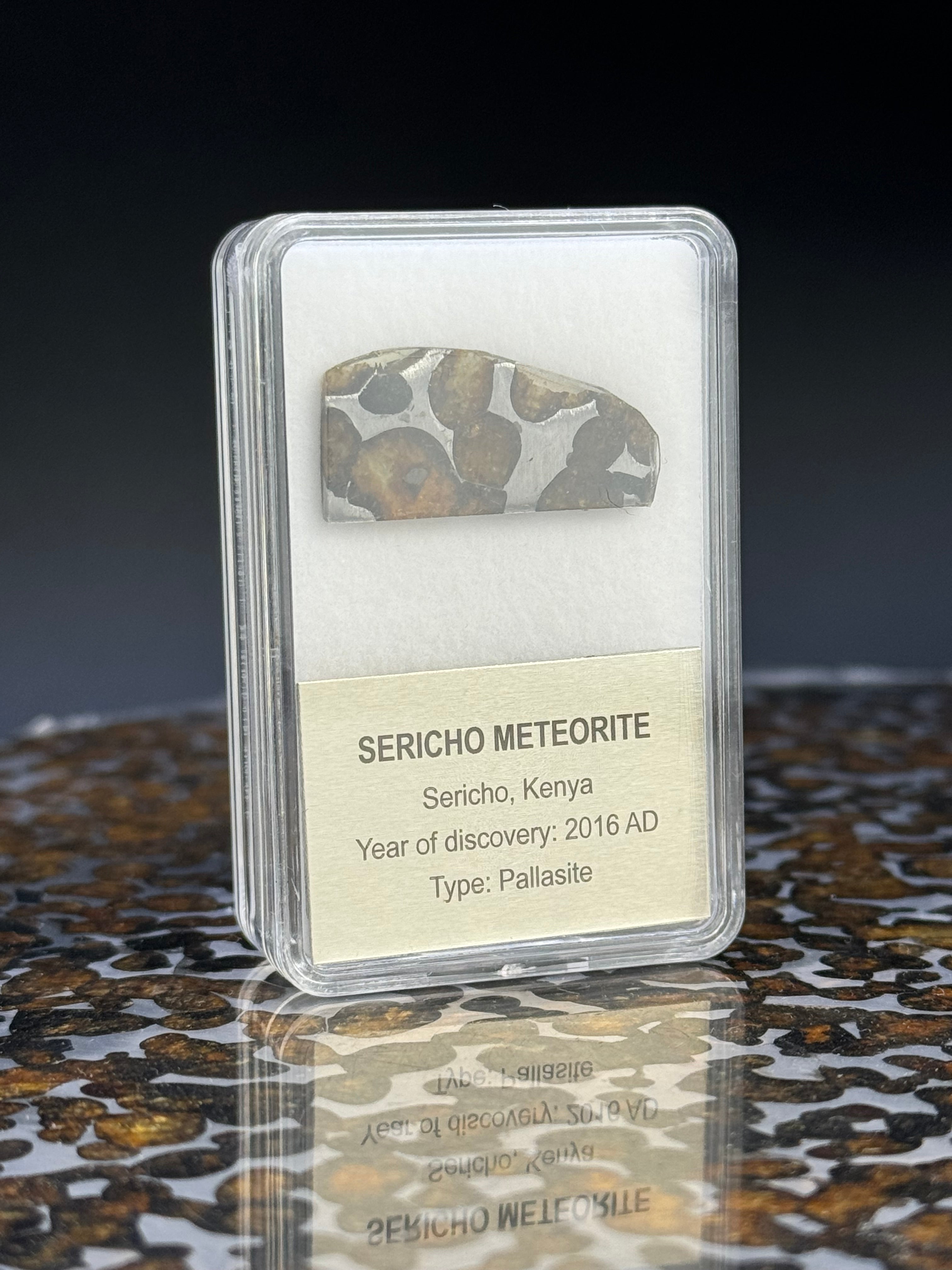 SERICHO METEORITE, KENYA. DISPLAY BOX. 2 GRAMS.