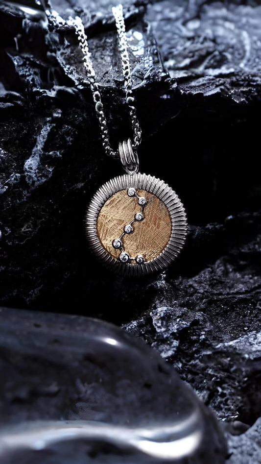 Our meteorite pendant for woman a captivating blend of elegance and cosmic charm. This unique meteorite jewelry piece adds a touch of celestial beauty, making it the perfect accessory for every woman.