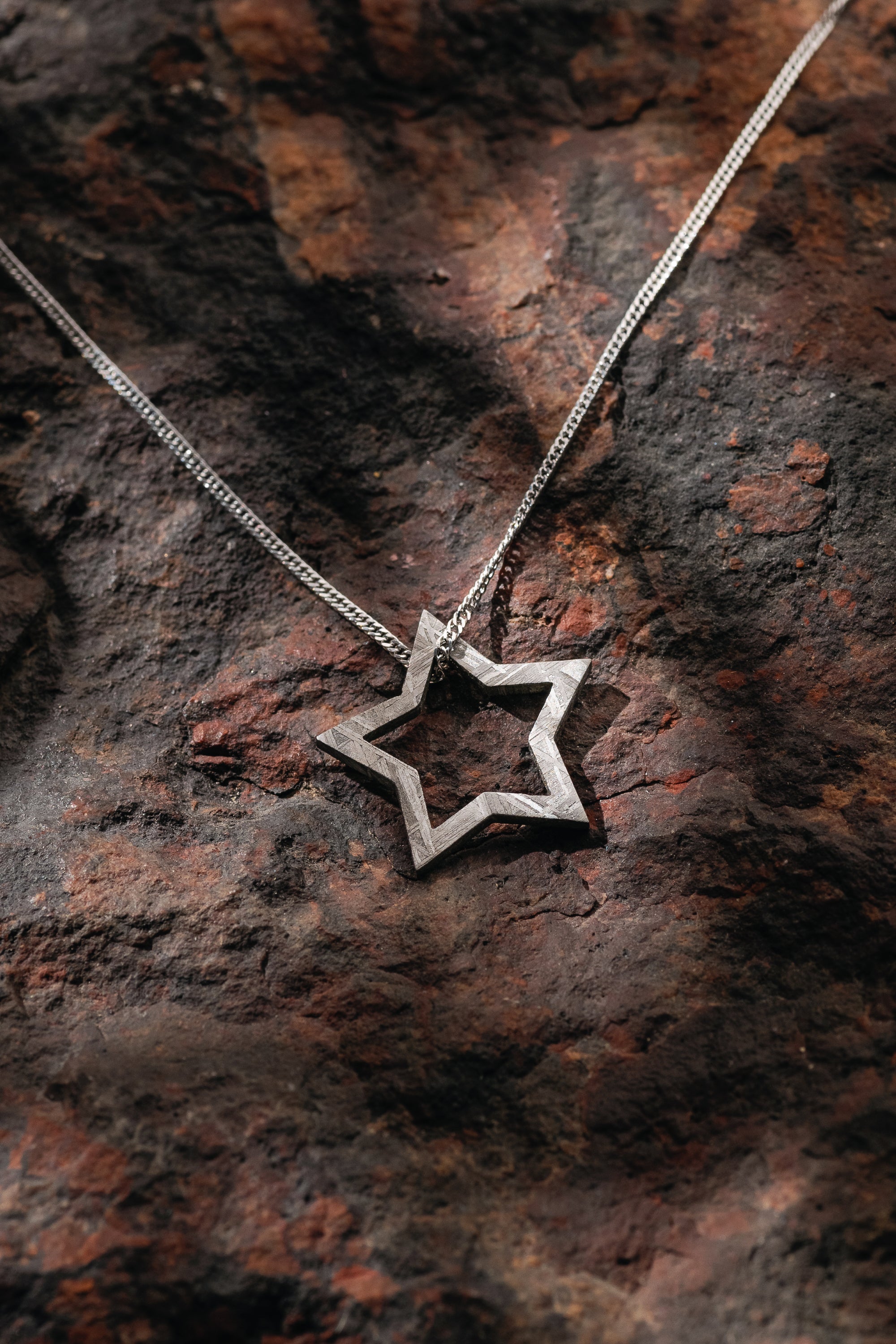 MUONIONALUSTA METEORITE STAR PENDANT