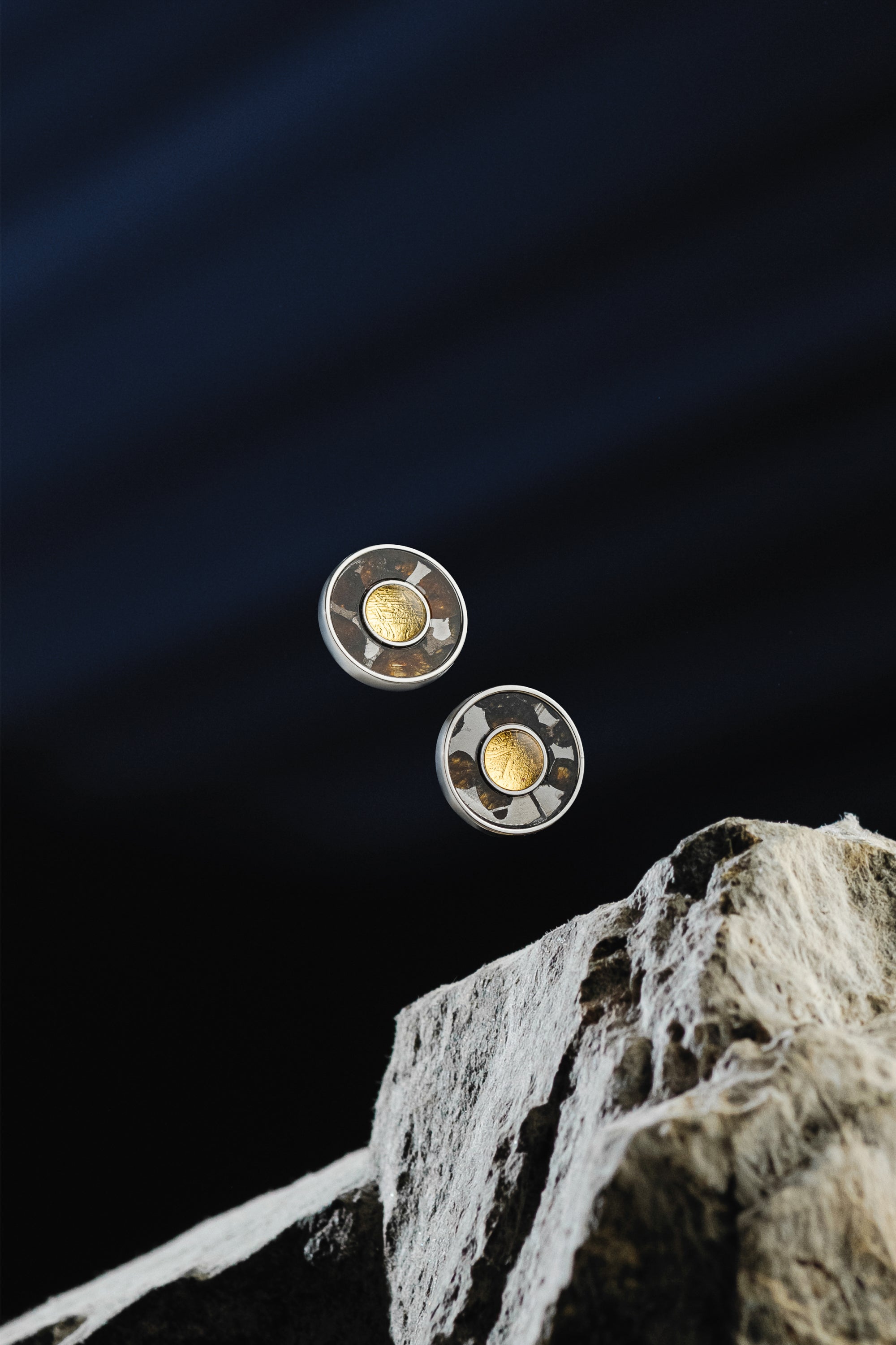 MUONIONALUSTA AND SERICHO METEORITE STUD EARRINGS, GOLD PLATED.