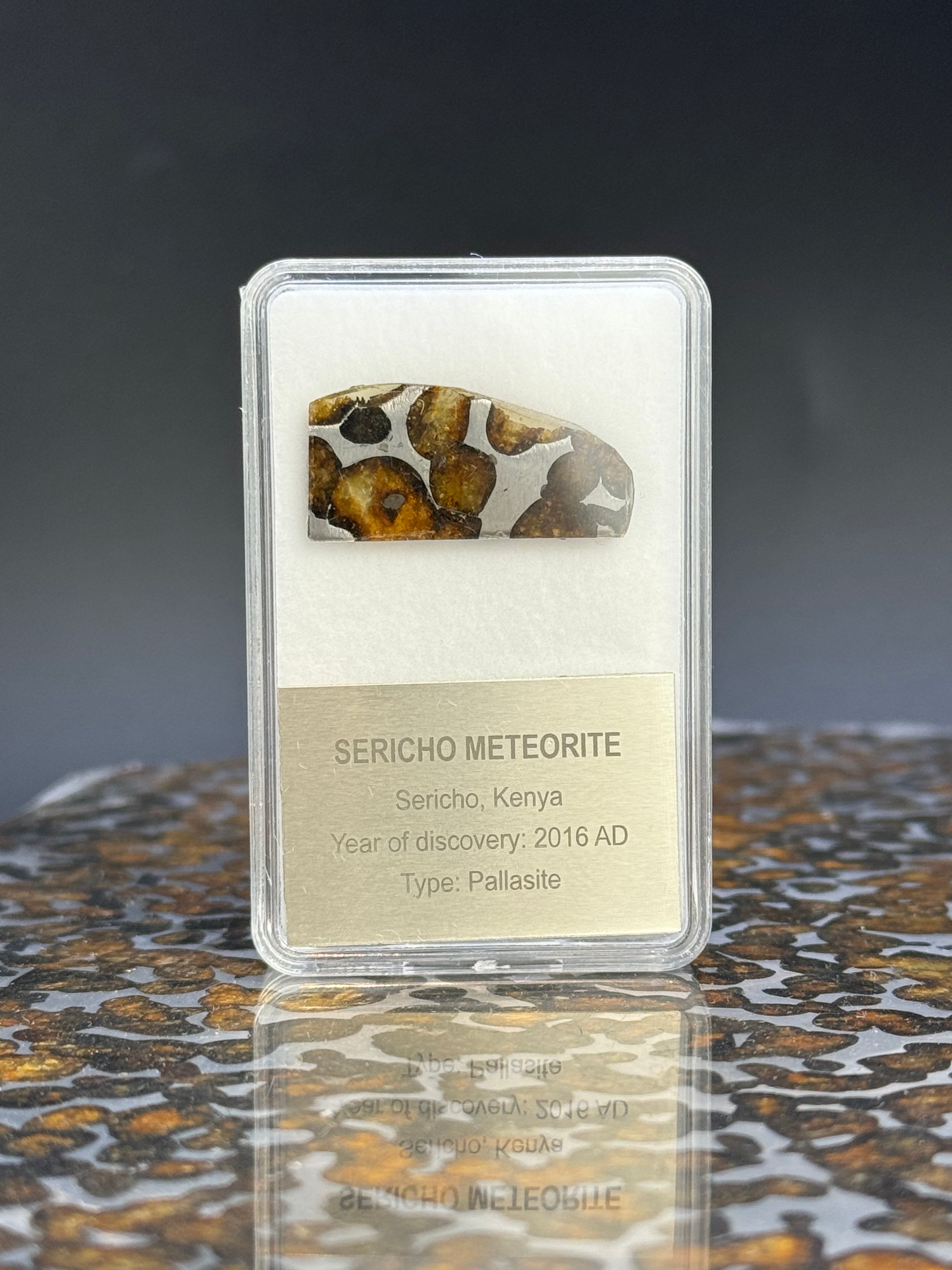 SERICHO METEORITE, KENYA. DISPLAY BOX. 2 GRAMS.