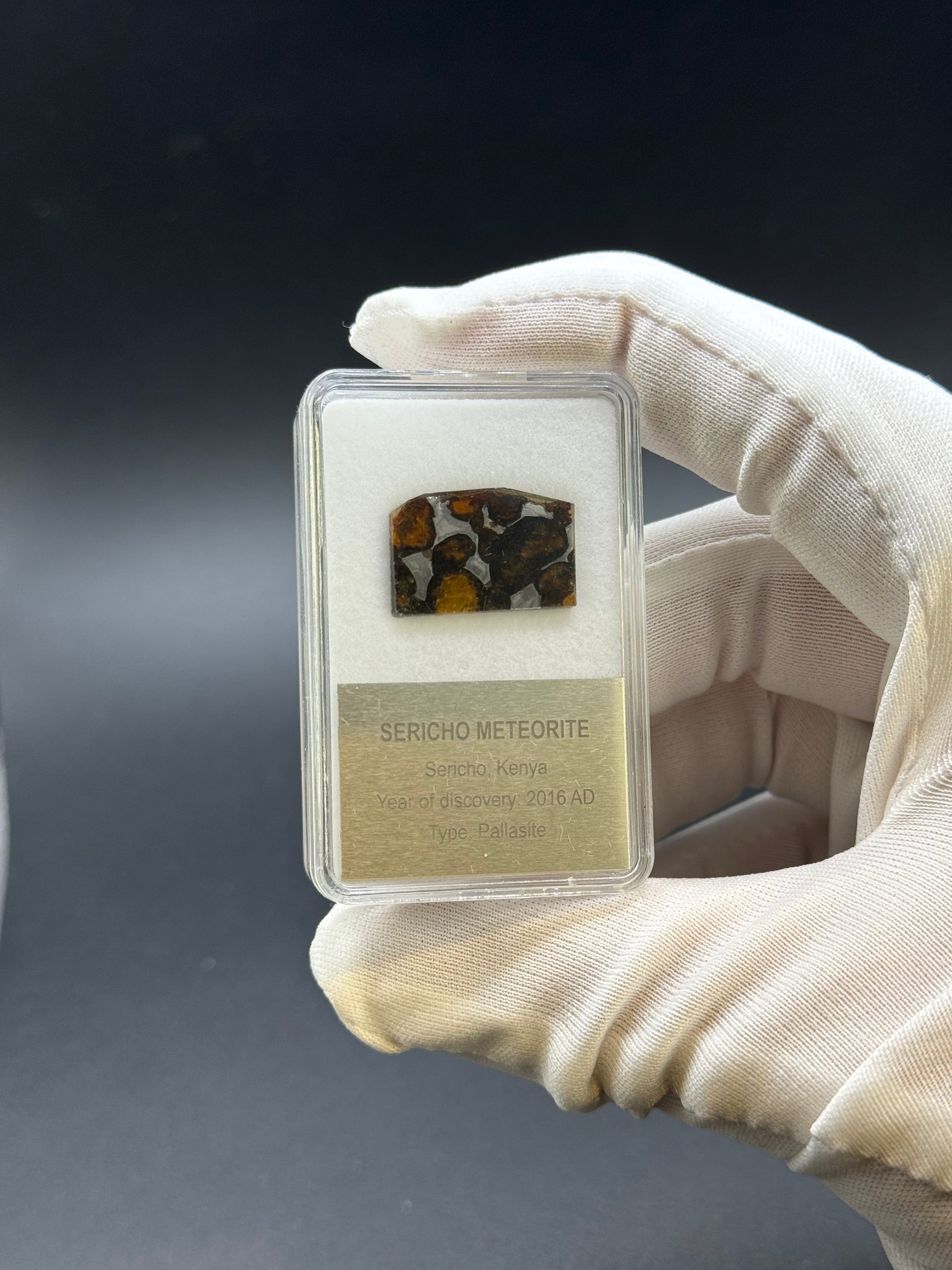 SERICHO METEORITE, KENYA. DISPLAY BOX. 2 GRAMS.