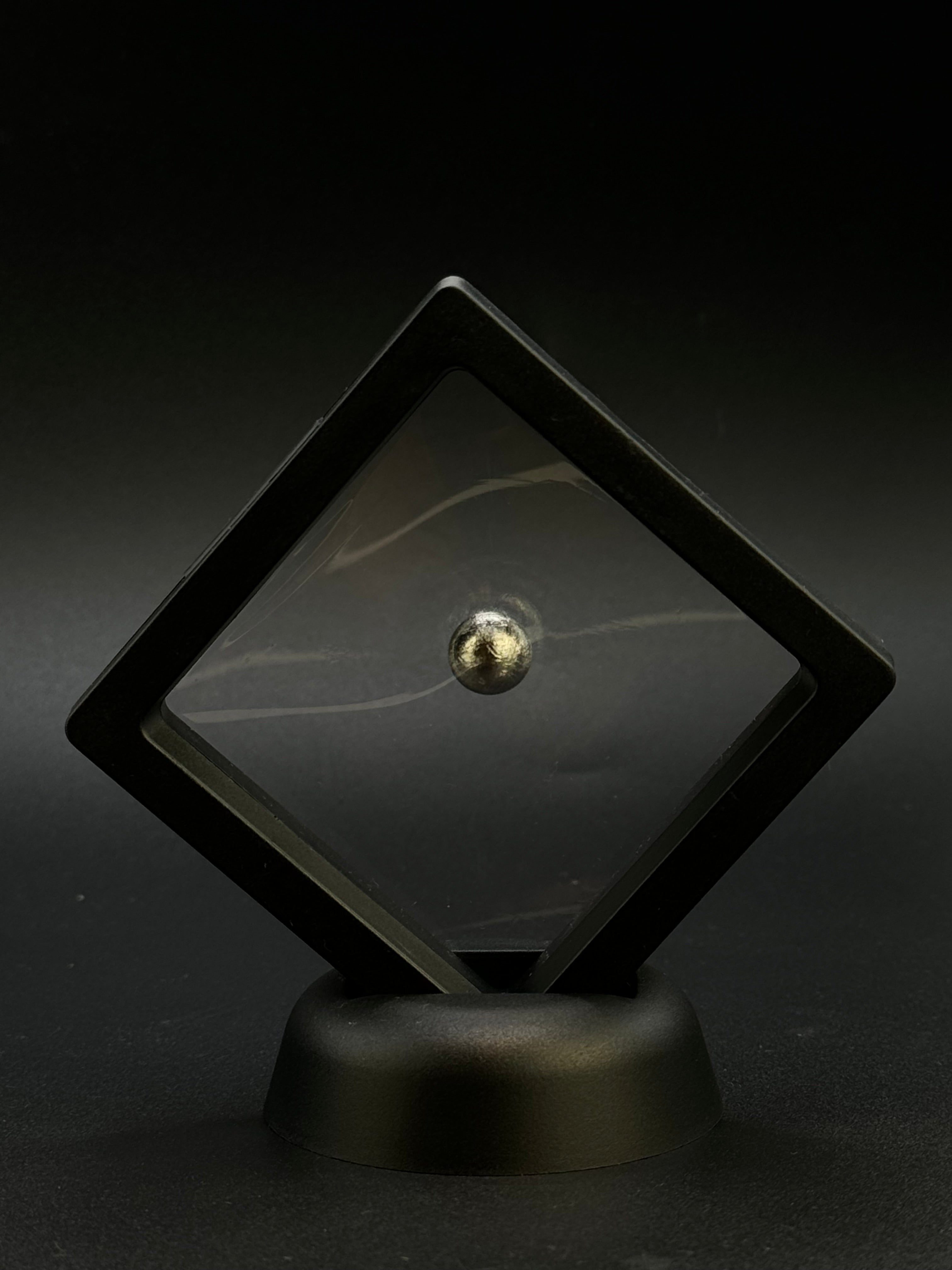 Muonionalusta meteorite, Sweden. 1cm sphere with display.