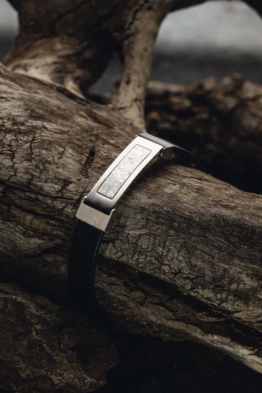Muonionalusta meteorite bracelet, meteorite jewelry collection. Genuine meteorite bracelet featuring a stylish leather strap for a unique and timeless accessory.